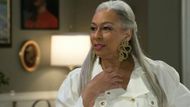 Beyond the Gates: Anita anticipates a house guest | Image: CBS